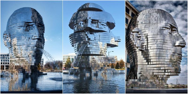 Metalmorphosis là đài phun nước được David Cerny, nhà điêu khắc Czech tạo nên, đặt tại Công viên Công nghệ Whitehall ở Charlotte, North Carolina, Mỹ. Tác phẩm điêu khắc này nặng 14 tấn, được làm từ các lớp thép không rỉ lớn xoay 360 độ. Ảnh: 